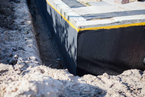 Professional Waterproofing technician working in Mitchell, IN